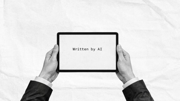 Picture of a man holding a tablet in his hands.